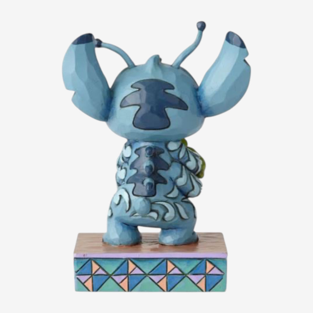 Stitch and a frog figurine