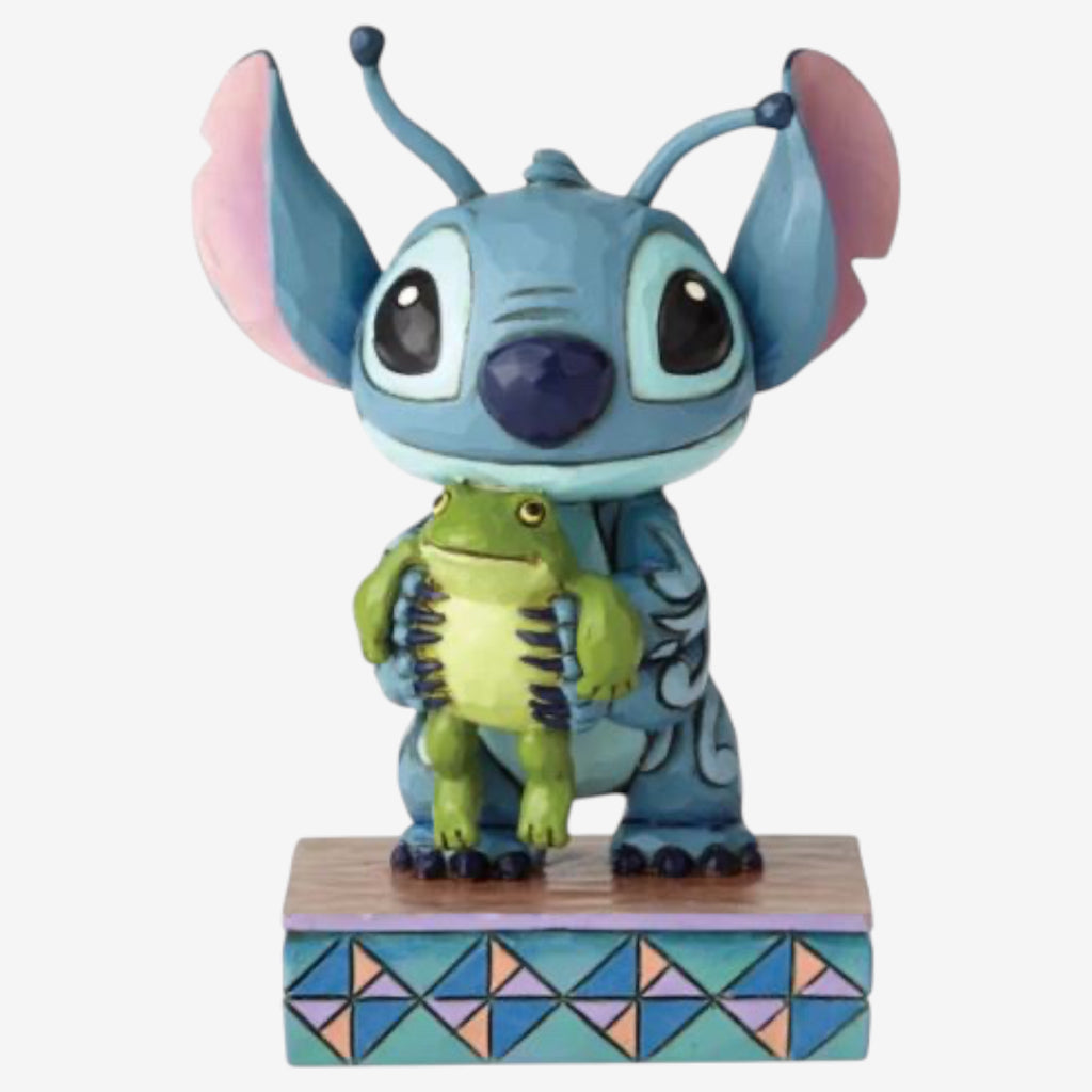 Stitch and a frog figurine
