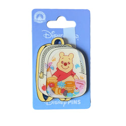 Pin Starter Pack Winnie l’Ourson, sac à dos jaune – Disneyland Paris