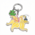 Porte-clés Pascal Raiponce avec fleur jaune – Disneyland Paris