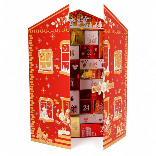 Calendrier de l’Avent Arribas Holiday Magic rouge et doré, portes entrouvertes montrant les tiroirs numérotés