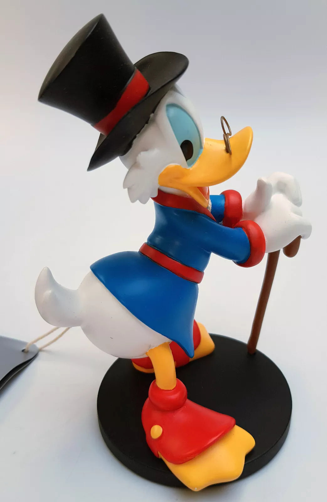 Figurine Picsou Disneyland Paris vue de profil droit