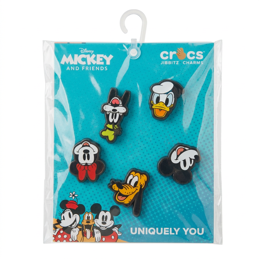 Fünferpack Crocs Jibbitz mit Micky, Minnie, Donald, Goofy und Pluto in der Verpackung