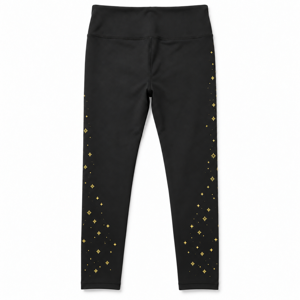 Legging Les Aristochats noir à étoiles dorées Disneyland Paris, vue de dos sur fond blanc.