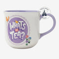 Once Upon Magic Alice in Wonderland ceramic mug featuring What's the Tea text, floral motifs, and a lilac handle.
