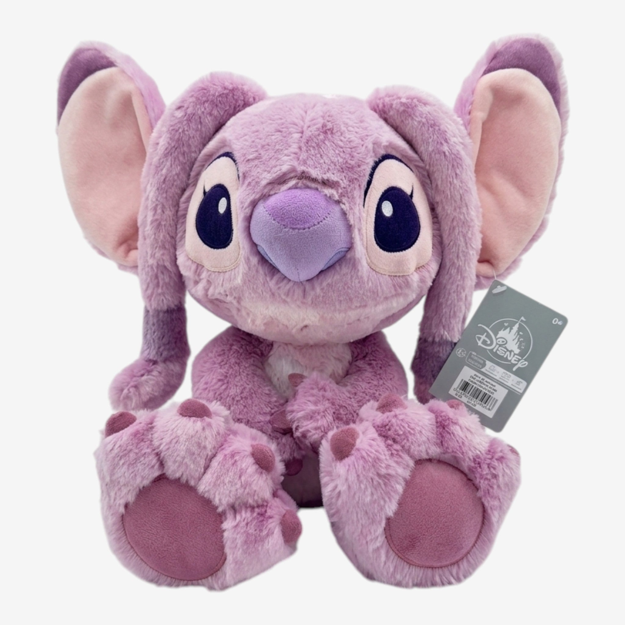 Once Upon Magic pink Angel Big Feet plush toy from Disneyland Paris, featuring large ears, antennae, and soft polyester material.