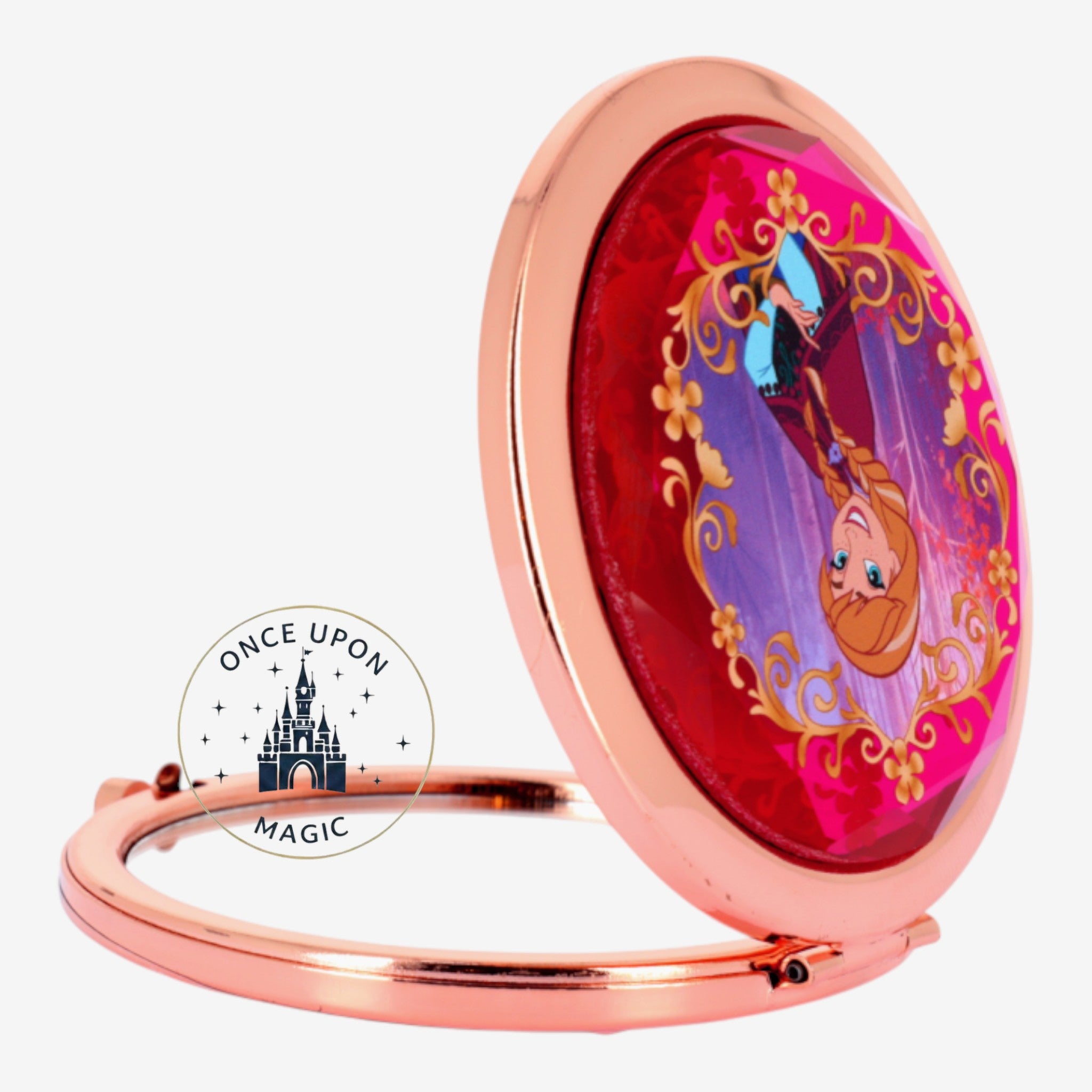 Once Upon Magic Anna compact mirror from Frozen, featuring Anna in a rose gold frame with red and purple accents.