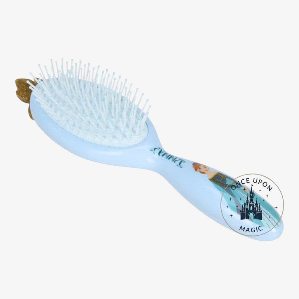 Once Upon Magic light blue hair brush with Anna from Frozen graphic and crown detail. Gentle bristles for detangling.