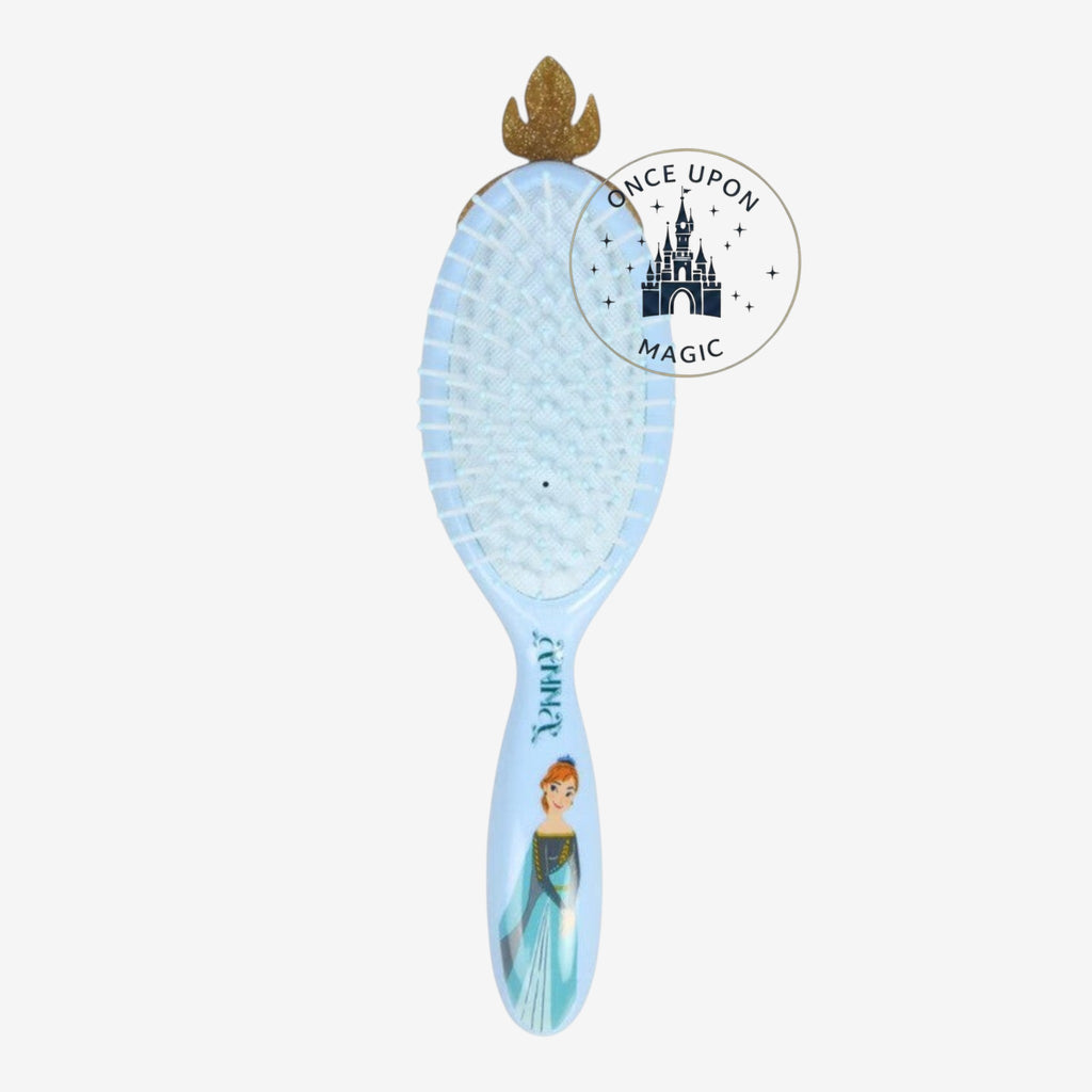 Once Upon Magic light blue hair brush with Anna from Frozen graphic and gold crown detail. Gentle bristles for detangling.