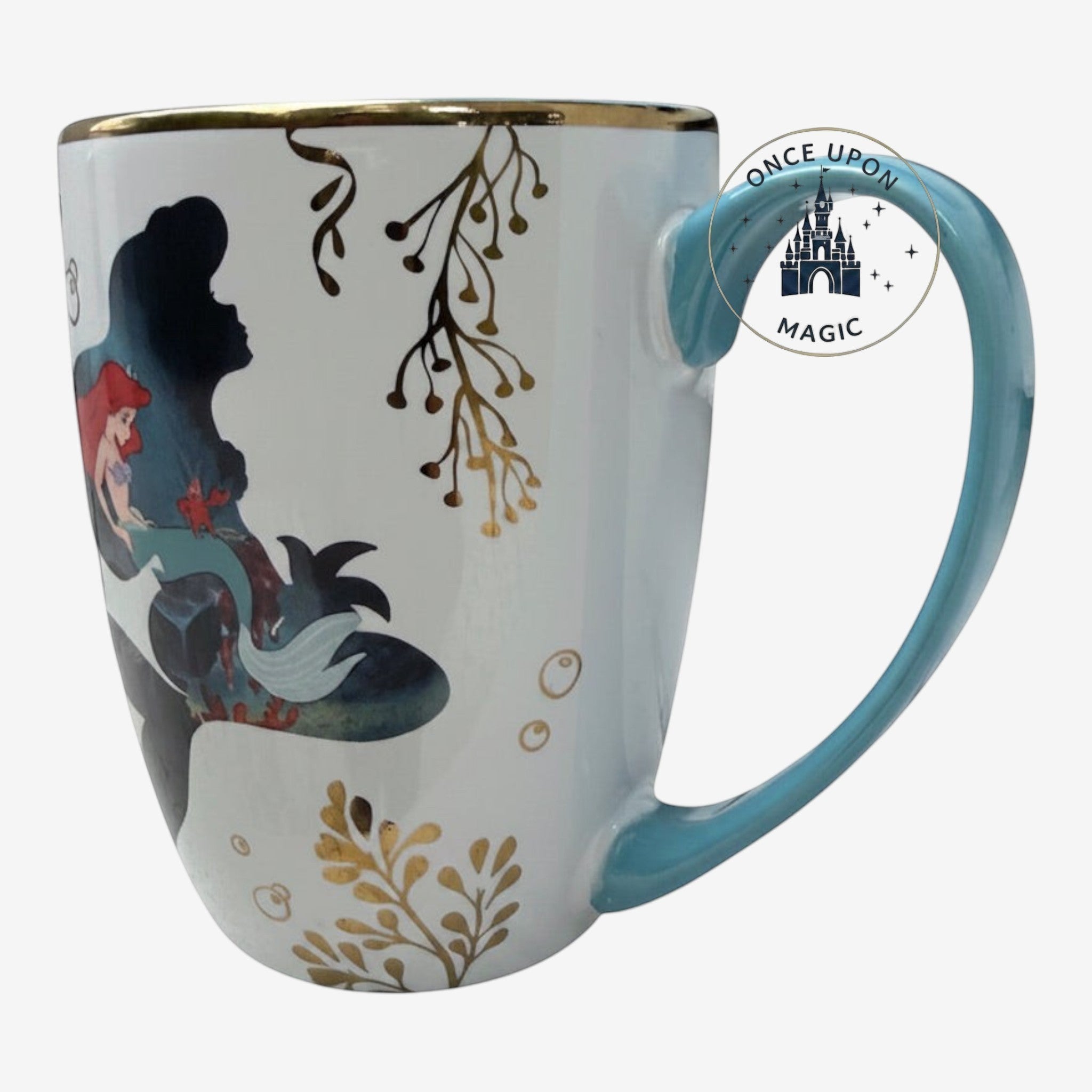 Once Upon Magic Disney Ariel ceramic mug with gold seaweed motifs and turquoise handle from The Little Mermaid