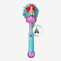 Once Upon Magic Ariel character wand featuring a mermaid figure on a purple seashell with a textured blue handle.