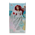 Once Upon Magic Disney Princess Ariel classic doll in a white satin wedding dress with green trim and veil, includes brush.