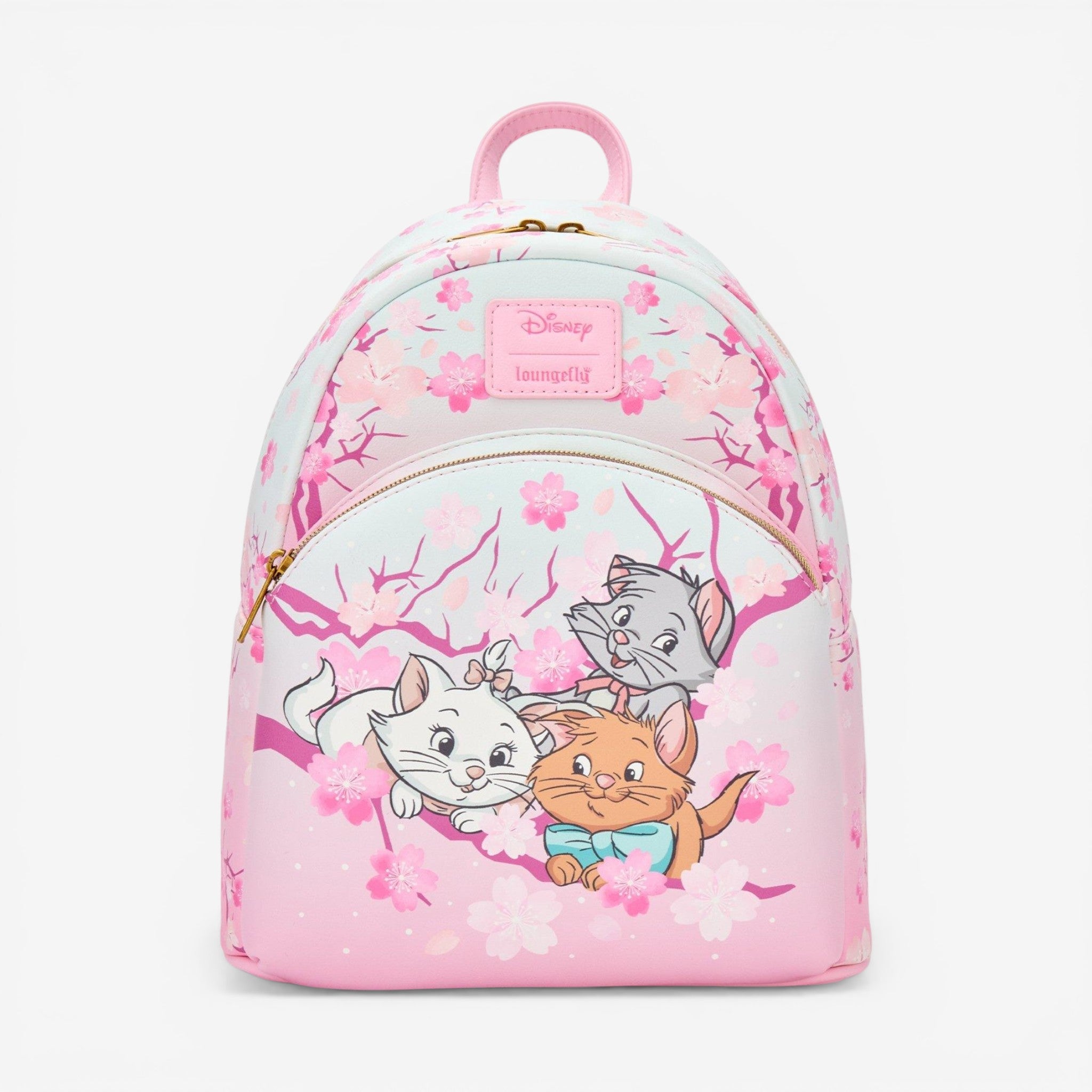 Once Upon Magic mini backpack featuring Marie, Toulouse, and Berlioz from The Aristocats among cherry blossoms. Pink and light blue.