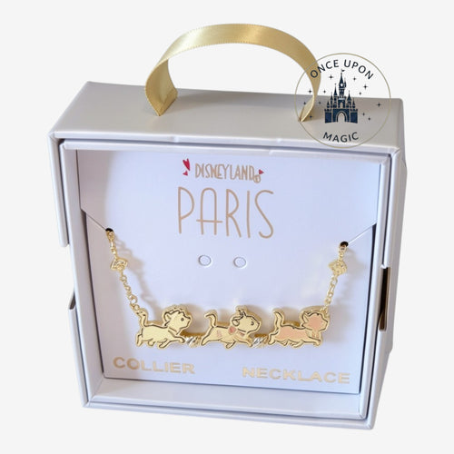 Once Upon Magic Disneyland Paris Aristocats necklace with gold-tone chain and three colorful enamel kitten charms.