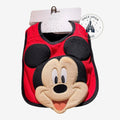 Bavoir rouge et noir pour bébé, orné de la tête de Mickey Mouse en relief. Produit officiel Disneyland Paris par Once Upon Magic.
