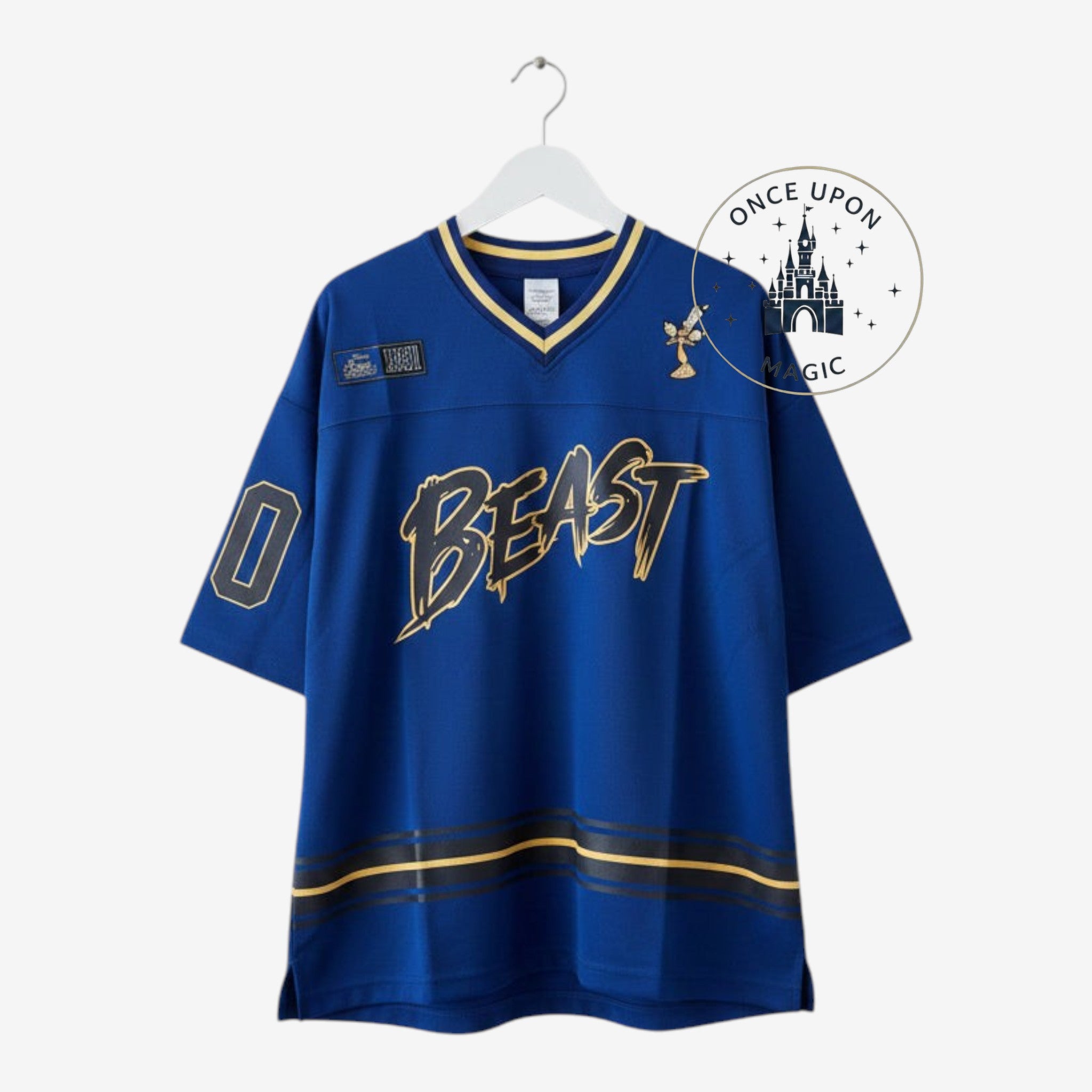 Once Upon Magic royal blue Beauty and the Beast hockey jersey with gold BEAST lettering and Lumiere embroidery