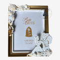 Once Upon Magic Beauty and the Beast photo frame with Belle and Beast figures, white roses, and gold accents.