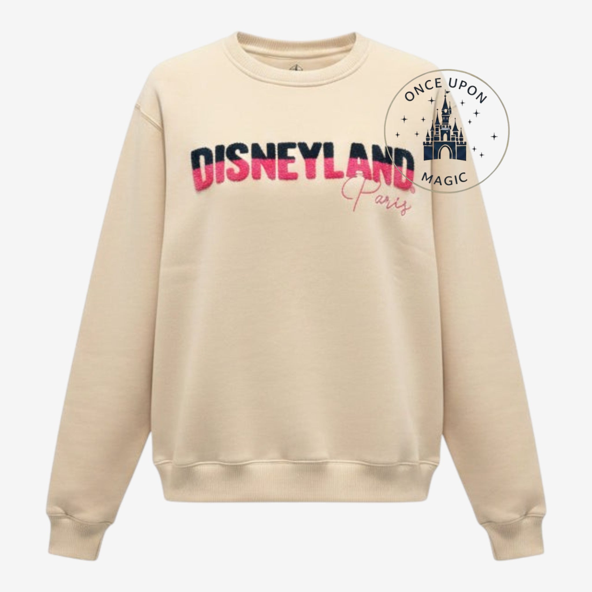 Once Upon Magic beige Disneyland Paris crewneck sweatshirt with textured pink and black logo lettering