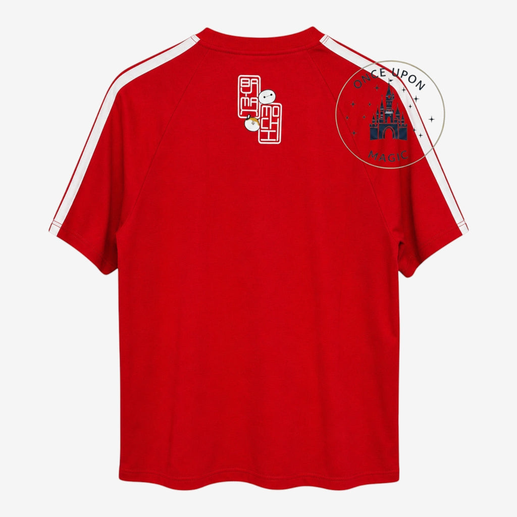 Once Upon Magic red Big Hero 6 t-shirt with white shoulder stripes and Baymax and Mochi logo on the back.