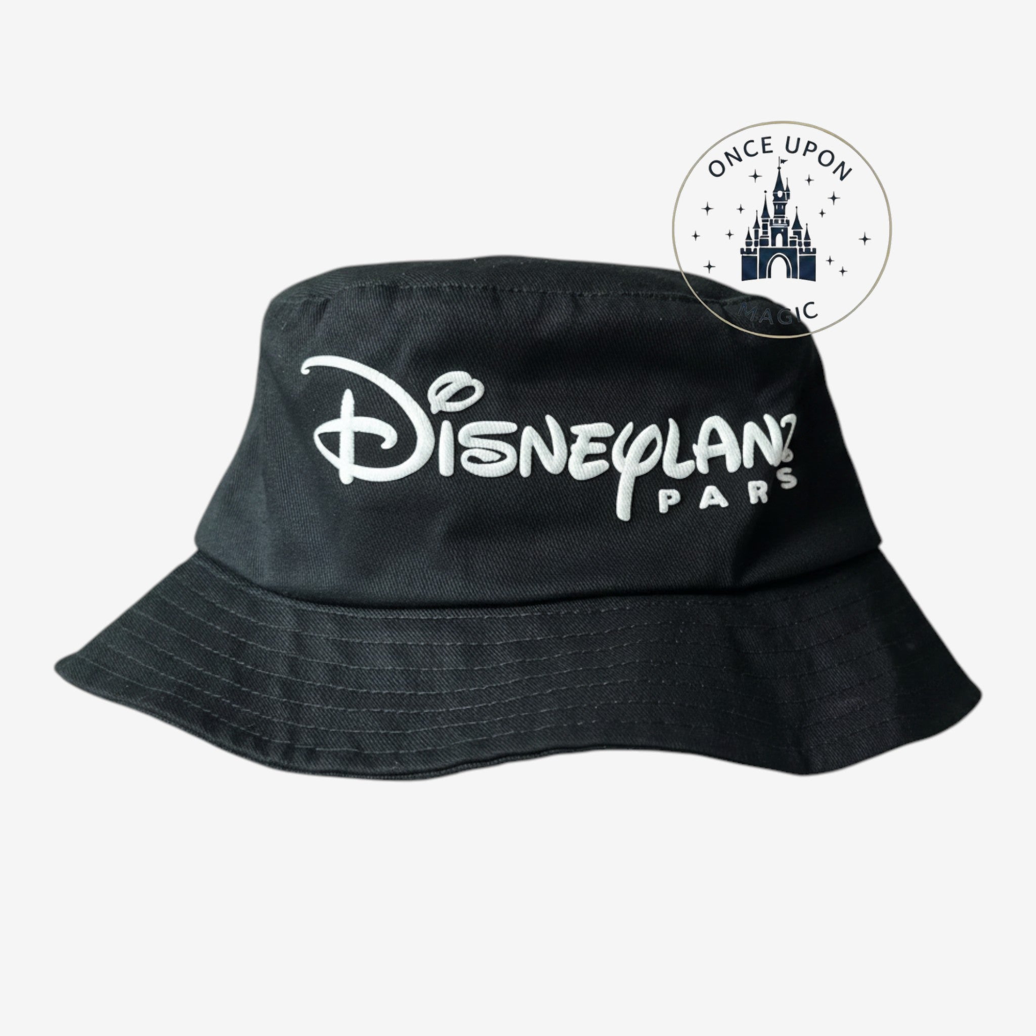 Once Upon Magic black cotton bucket hat with white embroidered Disneyland Paris logo on the front.