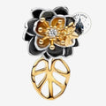 Breloque Once Upon Magic fleur bicolore noire et dorée avec cristal central et feuille ajourée pour bracelet