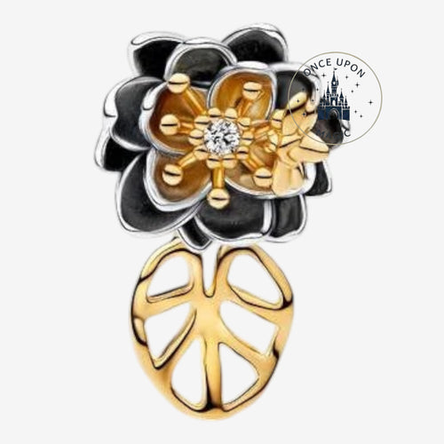 Breloque Once Upon Magic fleur bicolore noire et dorée avec cristal central et feuille ajourée pour bracelet