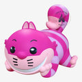Once Upon Magic Cheshire Cat collectible figurine with iconic pink and purple stripes and a wide, toothy grin.