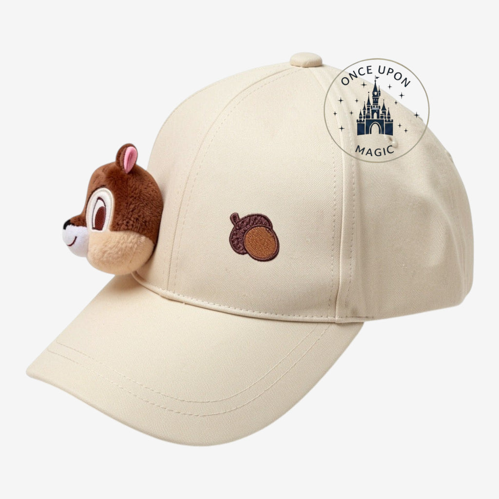 Once Upon Magic beige cotton baseball cap with a 3D Chip plush head and embroidered Chap acorn detail.
