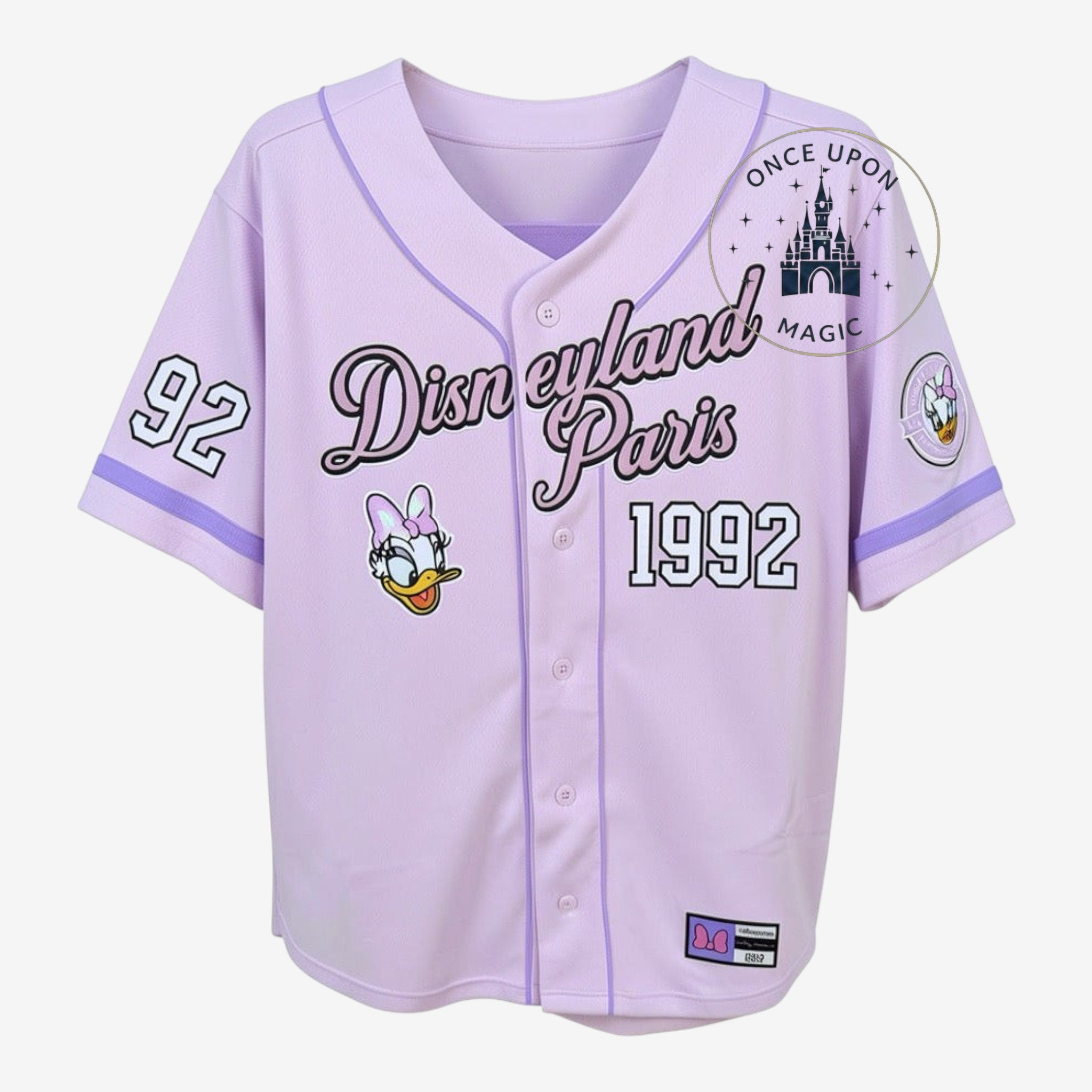 Once Upon Magic Disneyland Paris 1992 Daisy Duck baseball jersey in lilac with pink accents and graphic details.