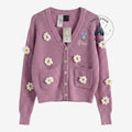 Once Upon Magic dusty mauve knit cardigan with 3D white daisy appliques and embroidered Daisy Duck character detail.