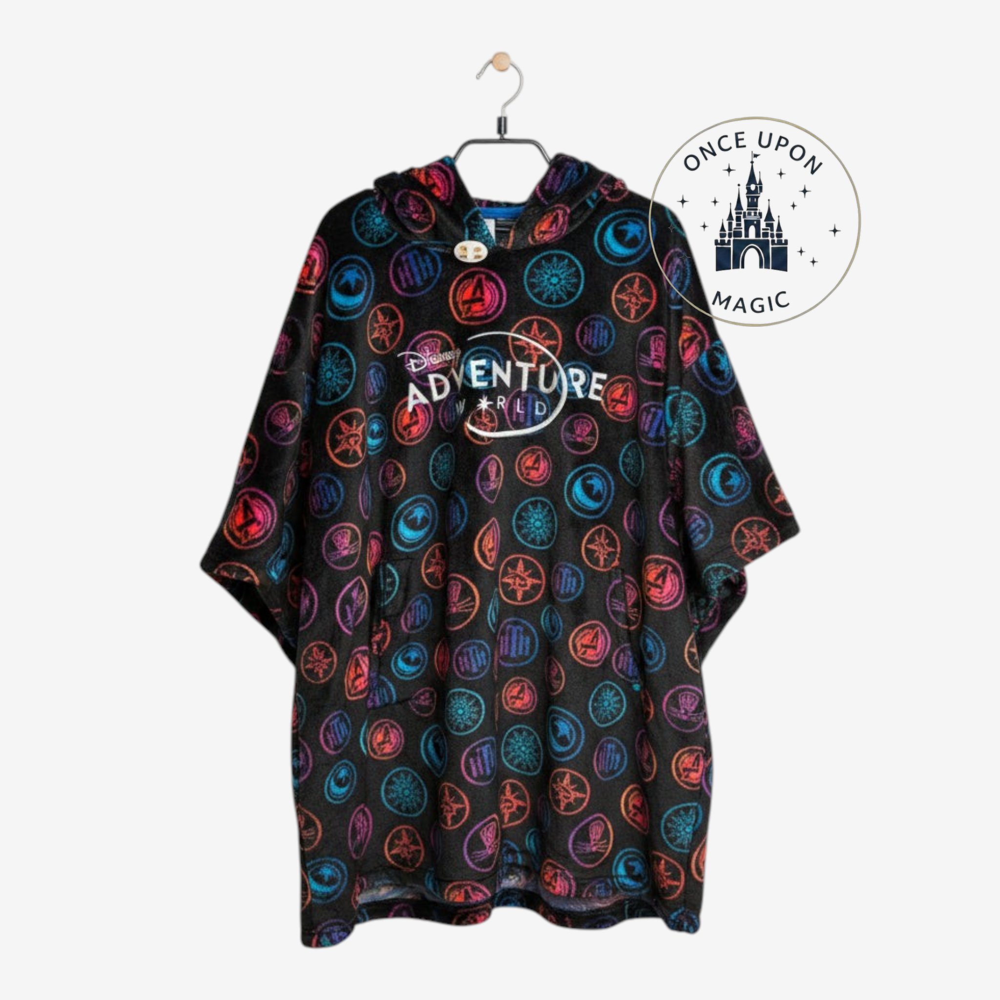 Once Upon Magic black fleece poncho with hooded design and colorful Disney Adventure World park emblems pattern.