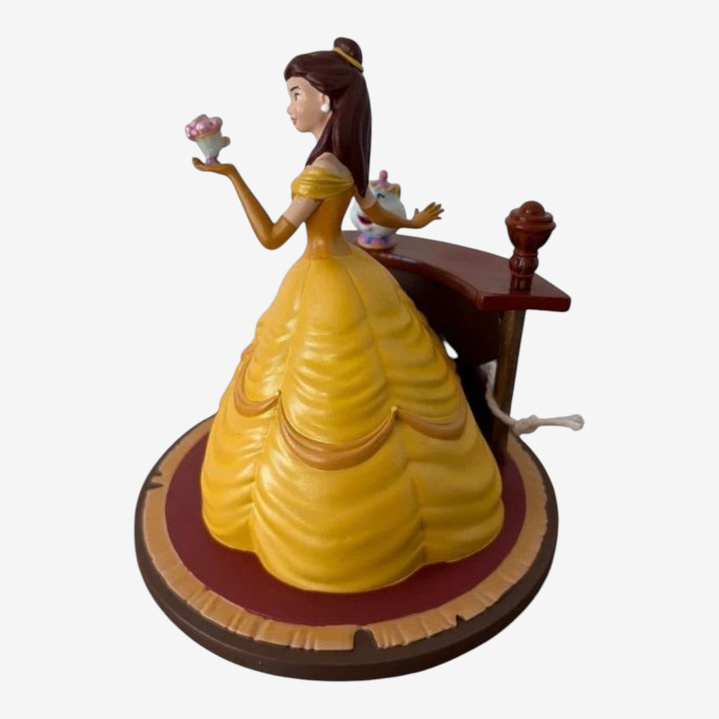Once Upon Magic Disney Princess Belle figurine in yellow ballgown holding a teacup. Includes Mrs. Potts and Chip.