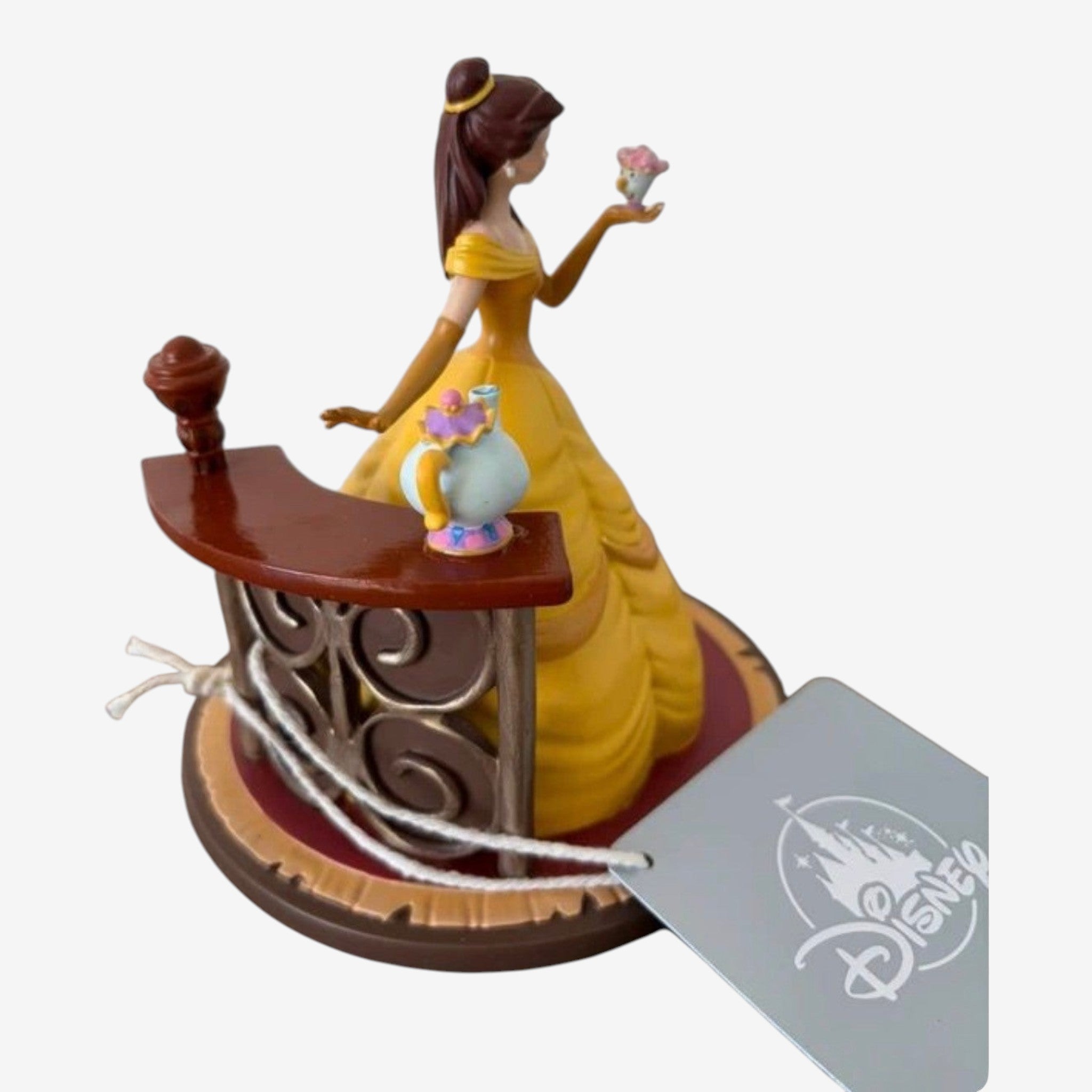Once Upon Magic Disney Princess Belle figurine in yellow ballgown holding a teapot and rose. Beauty and the Beast collectible.