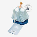 Once Upon Magic Disney Cinderella figurine in shimmering blue ballgown with white gloves and friends on base.