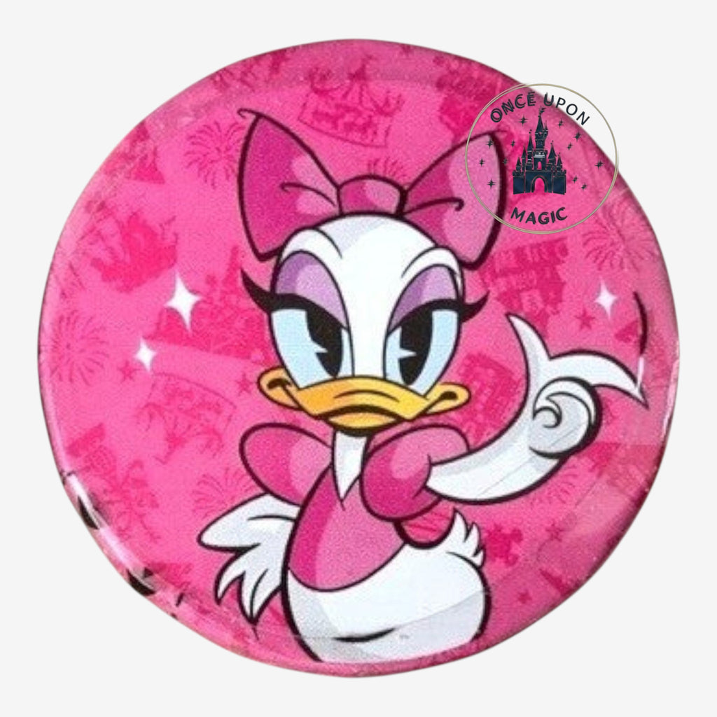 Once Upon Magic Daisy Duck pin with pink bow and dress, surrounded by Disney castle and fireworks graphics.