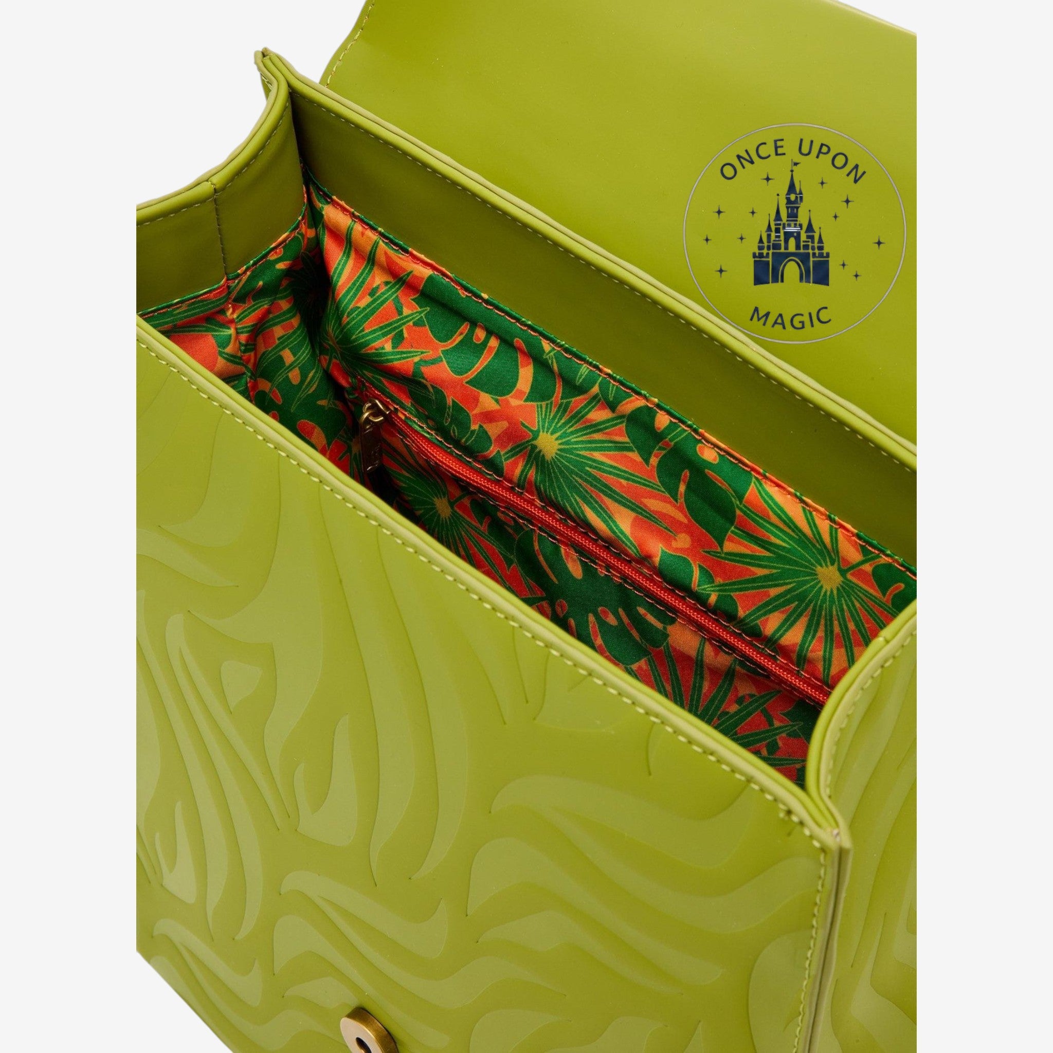 Once Upon Magic Disney The Lion King mini backpack with Simba, Timon & Pumbaa embroidered on flap. Lime green faux leather with embossed pattern.