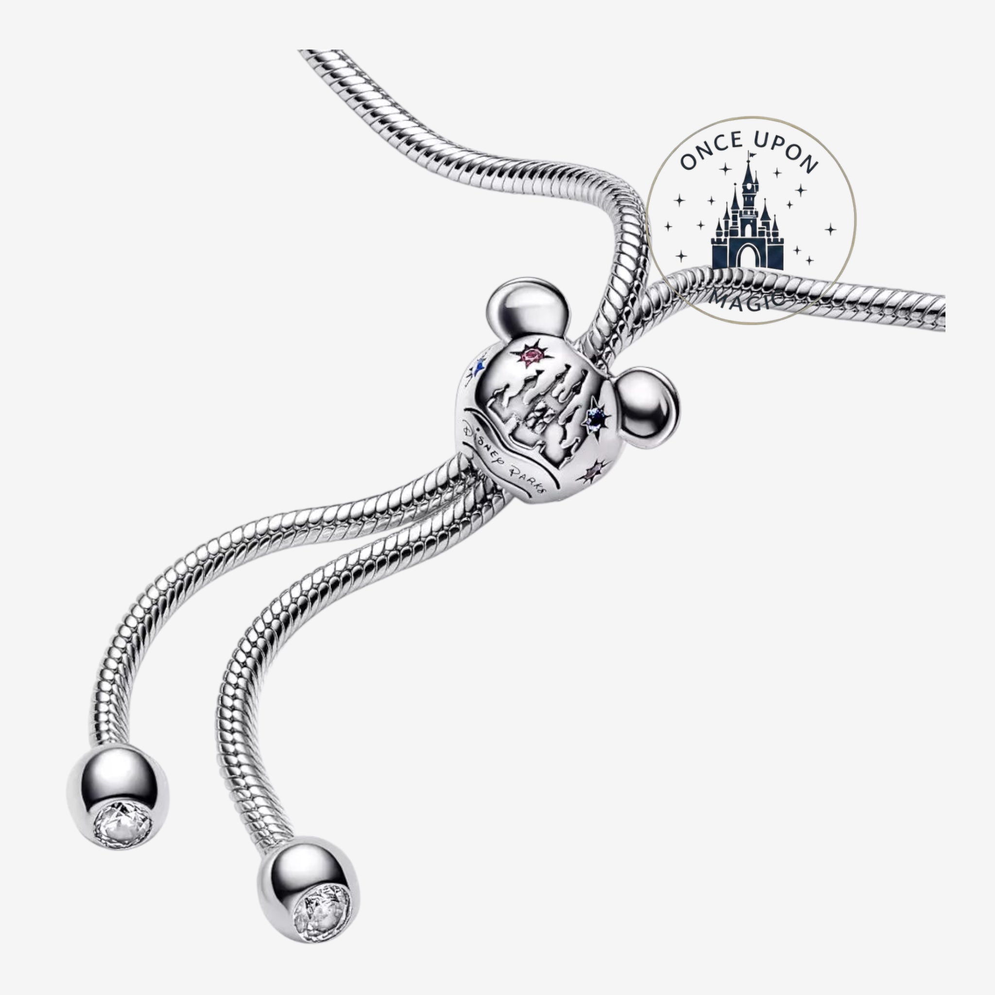 Once Upon Magic silver adjustable bracelet with Mickey Mouse head charm featuring Disneyland Paris castle and stars.