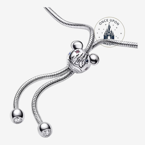 Once Upon Magic silver adjustable bracelet with Mickey Mouse head charm featuring Disneyland Paris castle and stars.