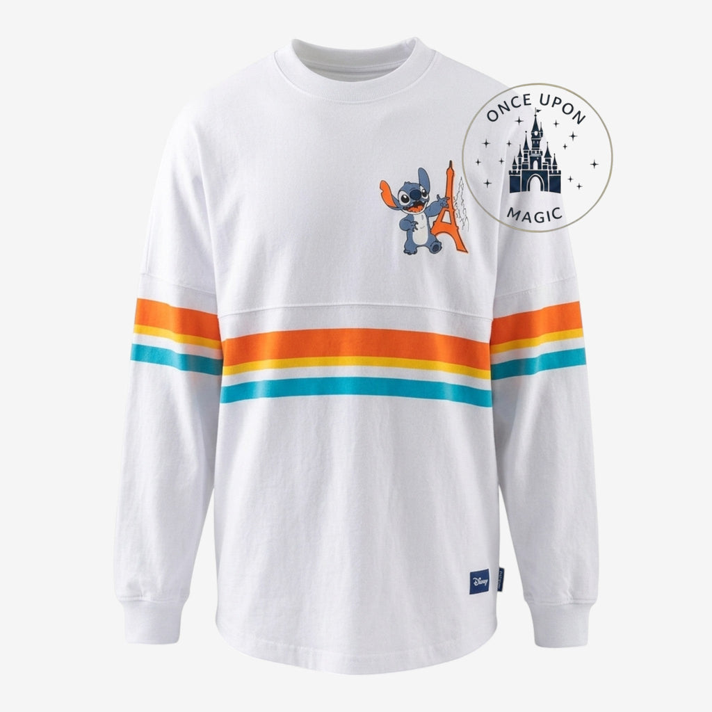 Once Upon Magic white Spirit Jersey with Stitch and Eiffel Tower graphic, featuring orange, yellow, and blue stripes on sleeves.