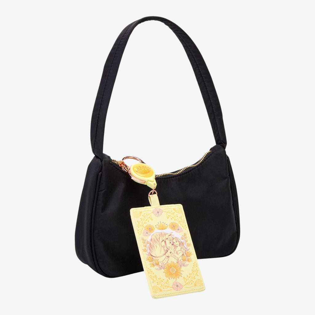 Once Upon Magic Disney Tangled Rapunzel & Maximus floral retractable lanyard with yellow badge. Black handbag.