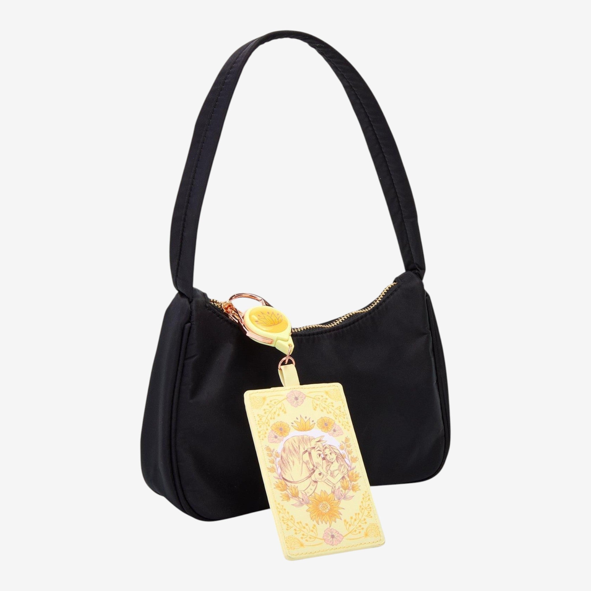 Once Upon Magic Disney Tangled Rapunzel & Maximus floral retractable lanyard with yellow badge. Black handbag.