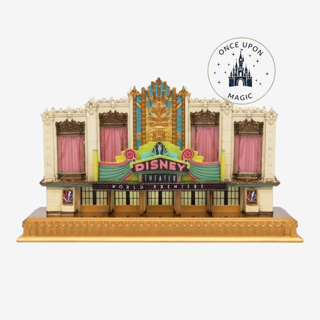 Once Upon Magic Disney Theater light-up figurine featuring Art Deco architecture, gold accents, and pink curtains.