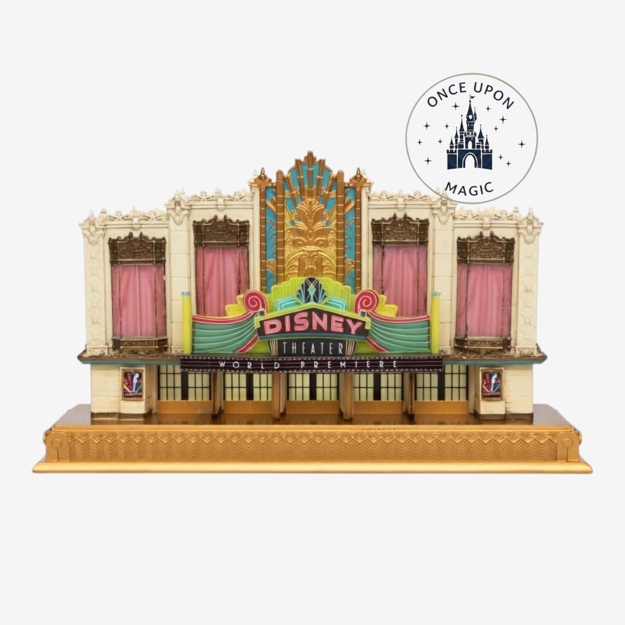 Once Upon Magic Disney Theater light-up figurine featuring Art Deco architecture, gold accents, and pink curtains.