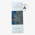 Once Upon Magic Disneyland Hotel home perfume with ornate blue and gold Mickey Mouse design on box.