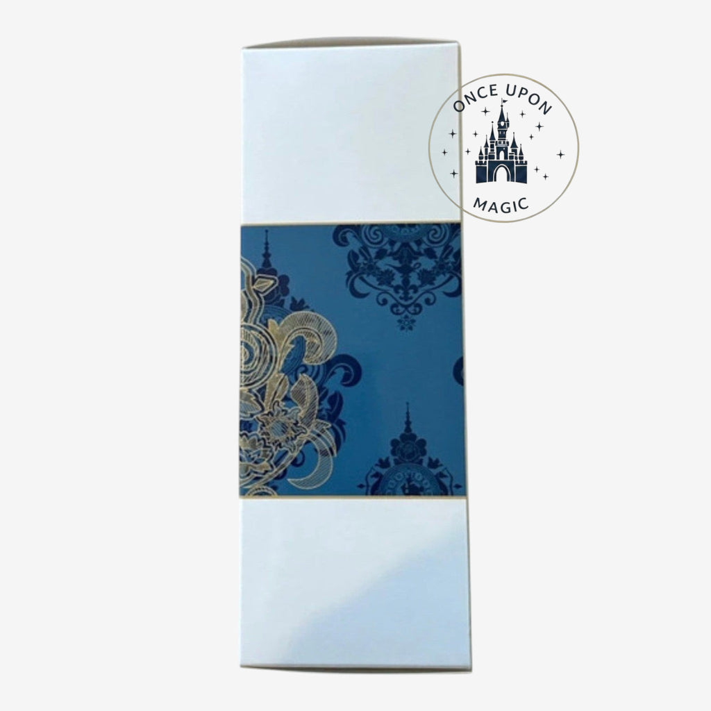 Once Upon Magic Disneyland Hotel room spray with blue and gold ornate pattern on a white box.