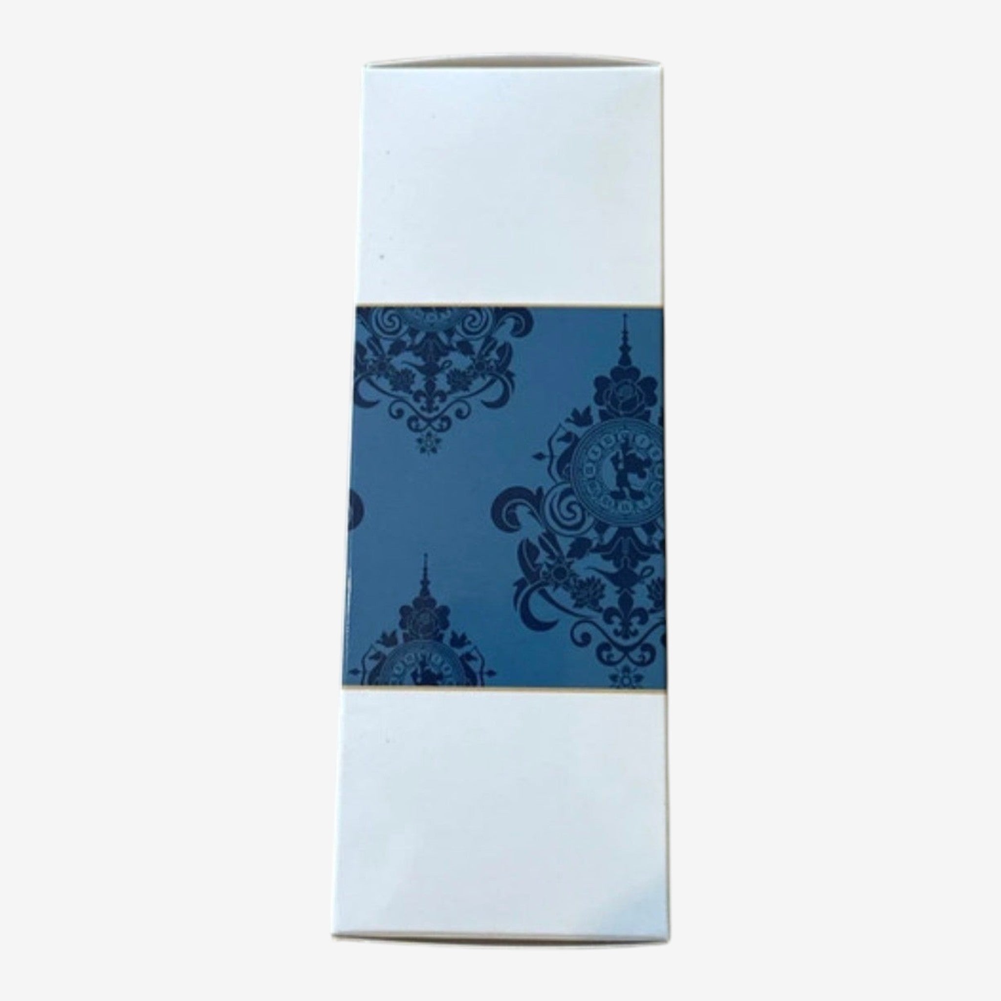 Once Upon Magic Disneyland Hotel room spray with blue ornate pattern on white box.