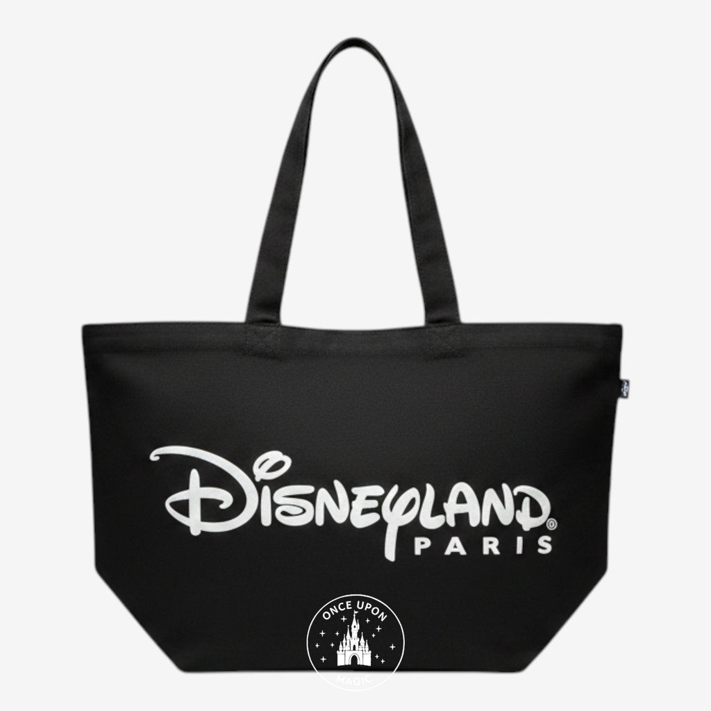 Once Upon Magic black canvas tote bag with white Disneyland Paris logo print and sturdy shoulder straps.
