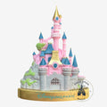 Once Upon Magic pink and blue Sleeping Beauty Castle magnet from Disneyland Paris. Features gold accents and a grey stone base.