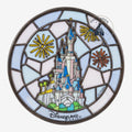 Once Upon Magic stained glass mini window hanging of Disneyland Paris castle with sunbursts and fireworks. Pastel colors.