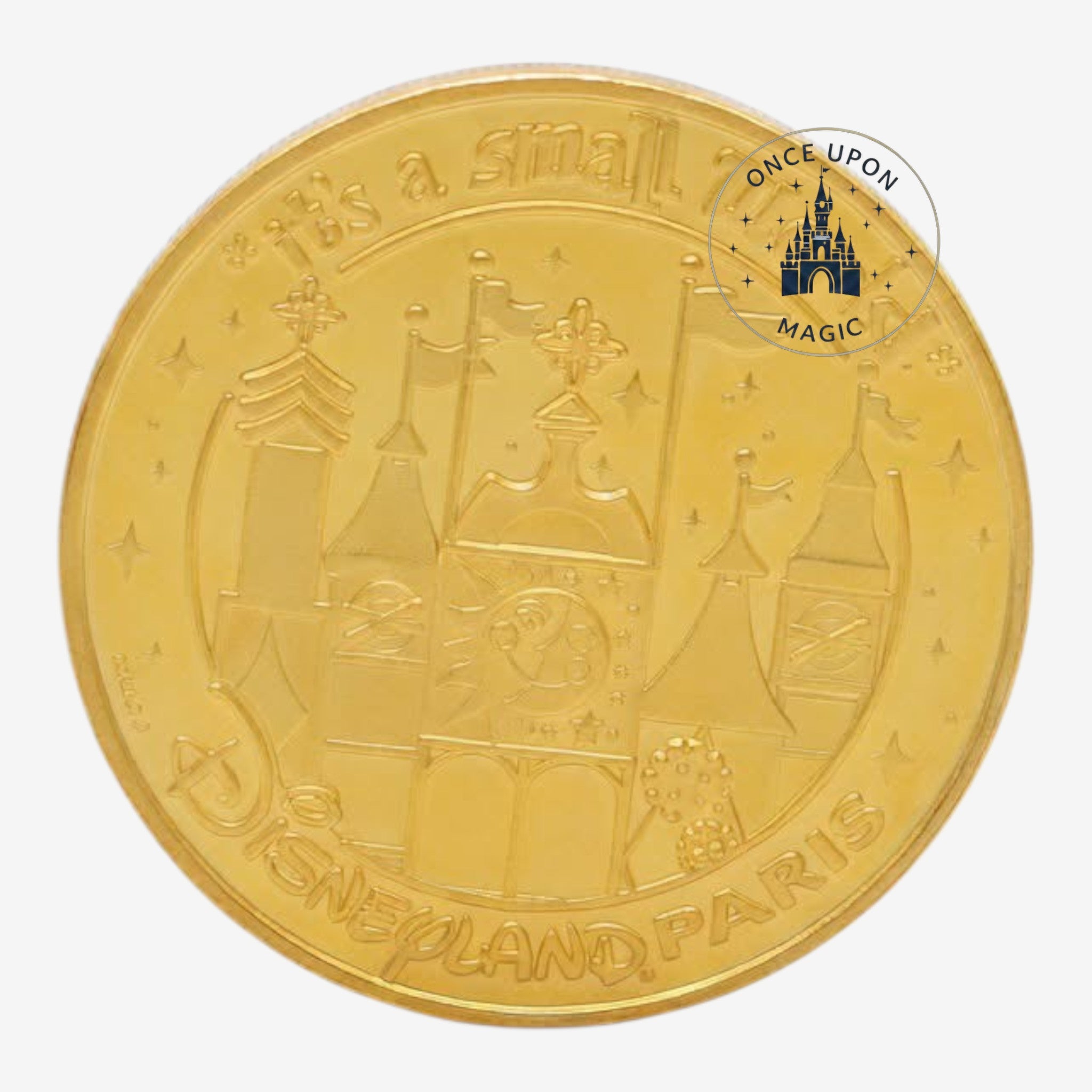 Once Upon Magic gold-toned Disneyland Paris It's A Small World commemorative coin with embossed attraction facade.